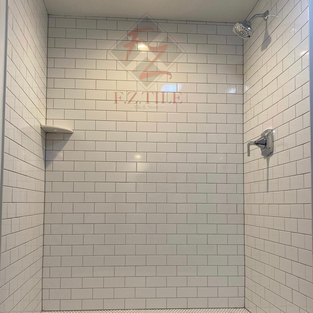 Floor-to-ceiling white subway shower
