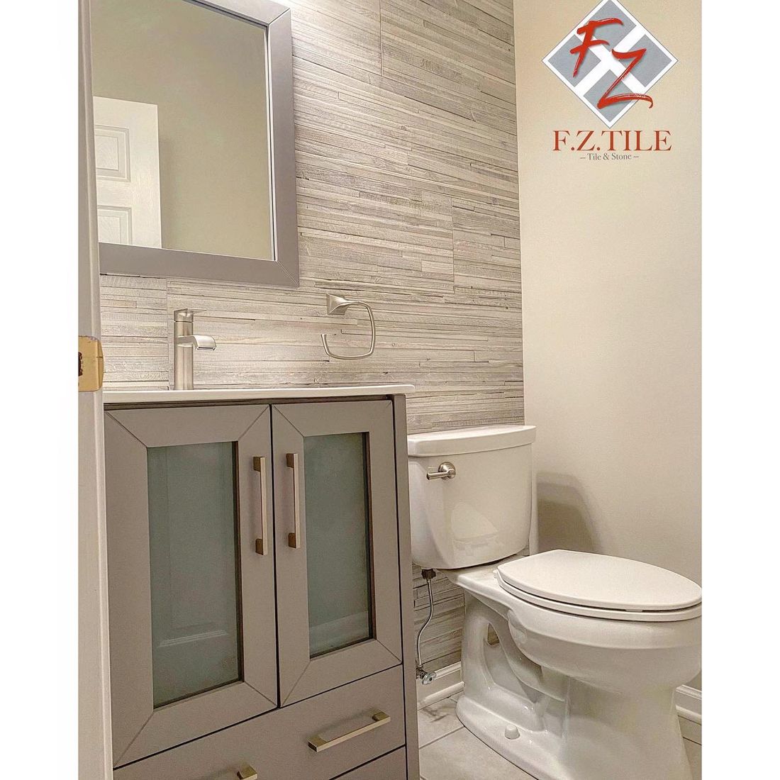 Textured tile wall with floating vanity